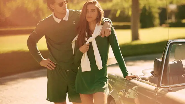 A young couple poses wearing J. Pritchard apparel.
